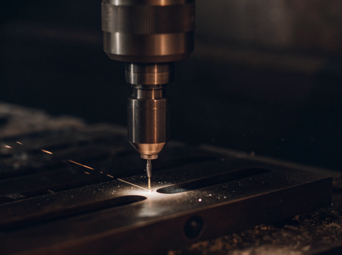 Alumina ceramic edge with chipping and micro-cracks from conventional grinding, showing why ceramic is hard to cut